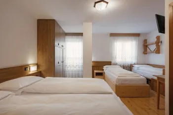 Hotel la montanara camera quadrupla 1