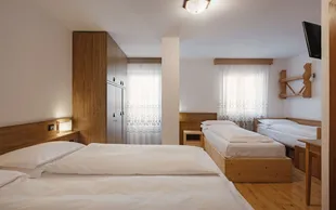 Hotel la montanara camera quadrupla 1