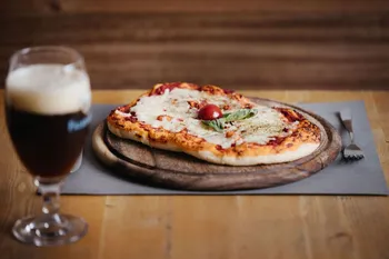 Pizza e birra scura a Predazzo